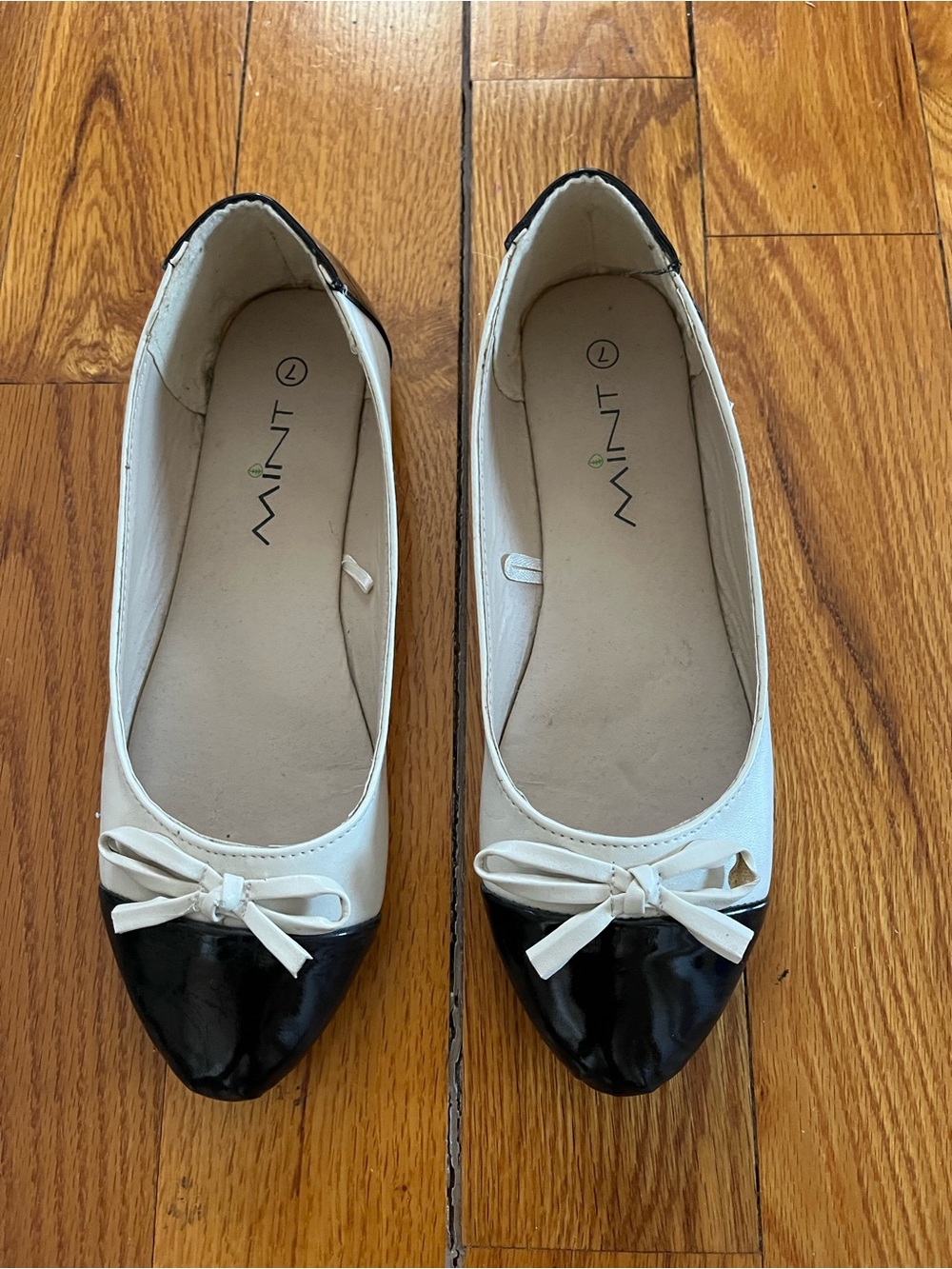 Free with purchase. Mint Two-Tone Pointed Toe Ballet Flats in White and Black